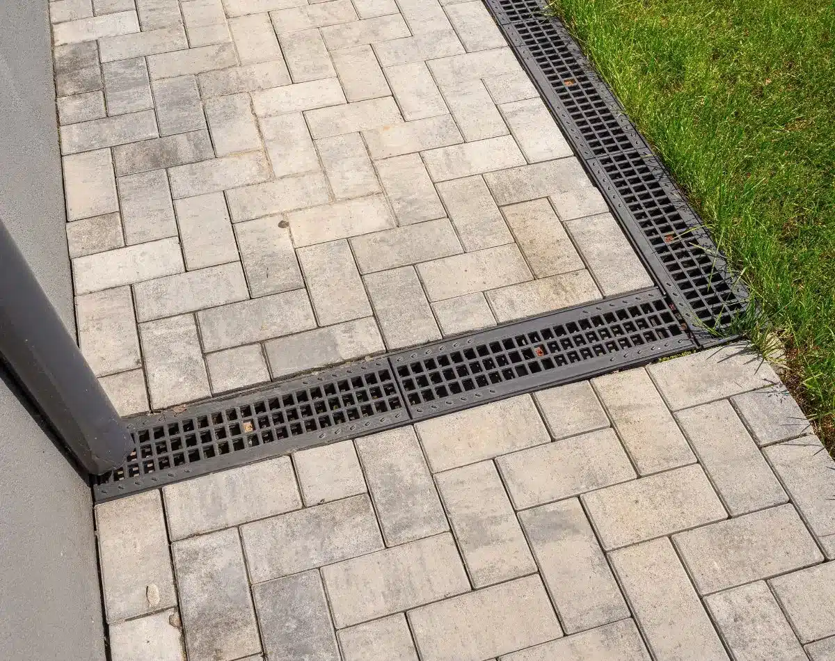 Walkway pavers being laid and cut to line