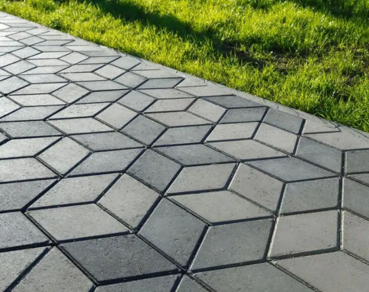 Straight geometric paver path in a modern layout