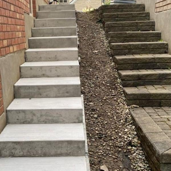 Concrete steps rising between angled walls