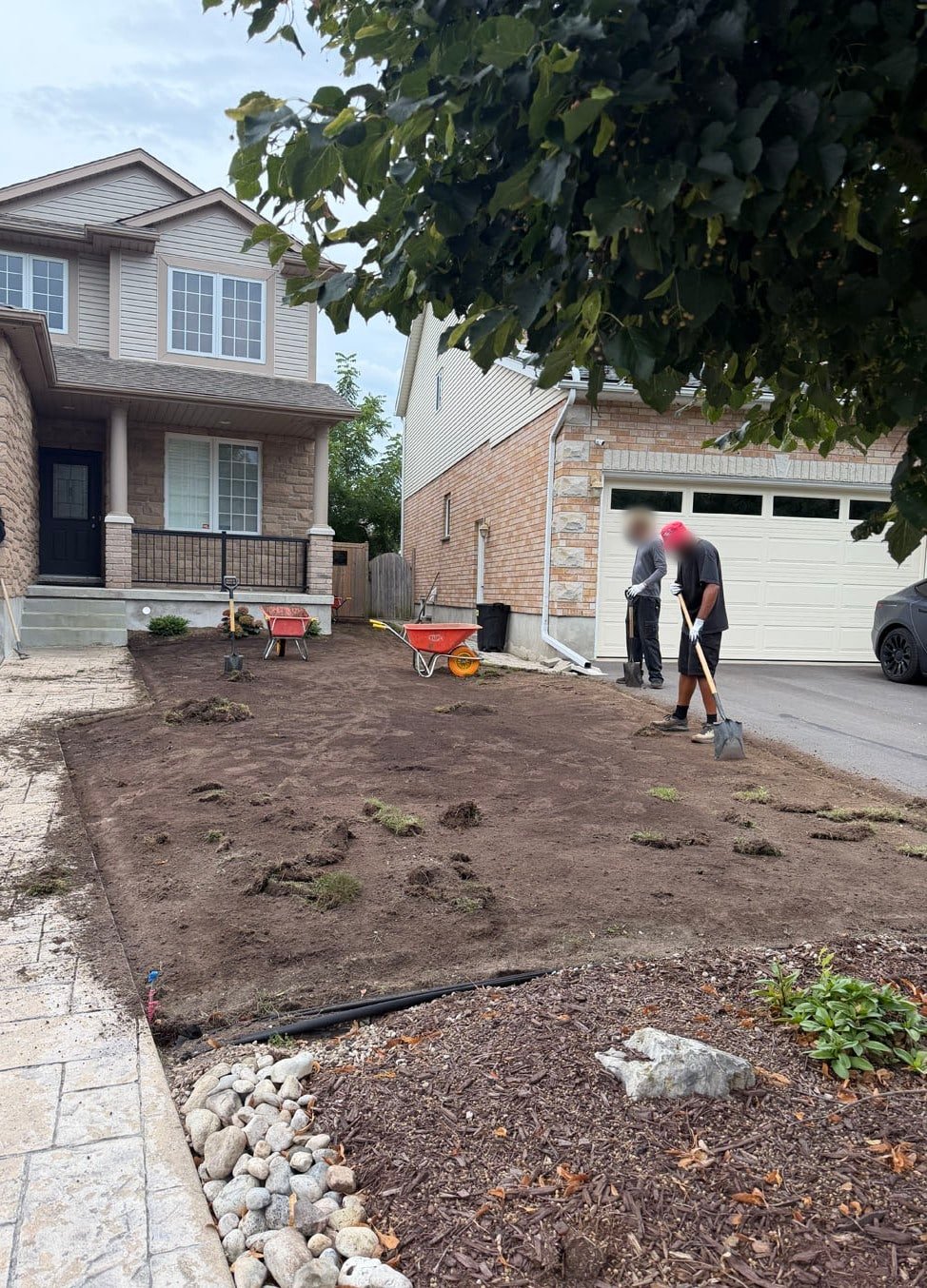 Crew Clearing Stripped Front Lawn Waterloo