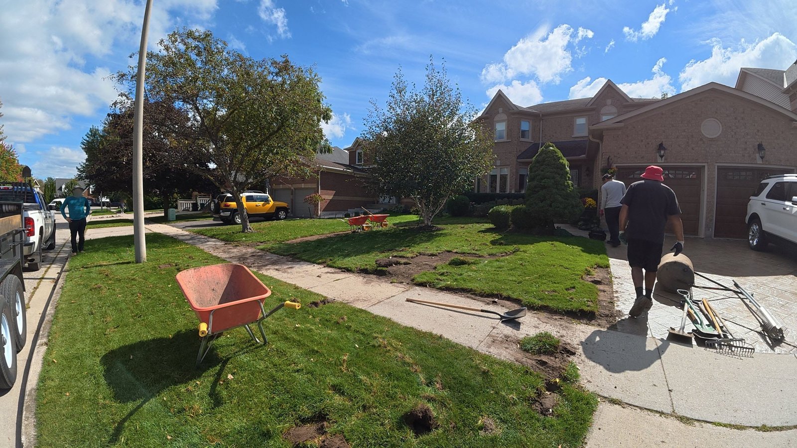 Drum Roller And Rakes On Driveway Cambridge
